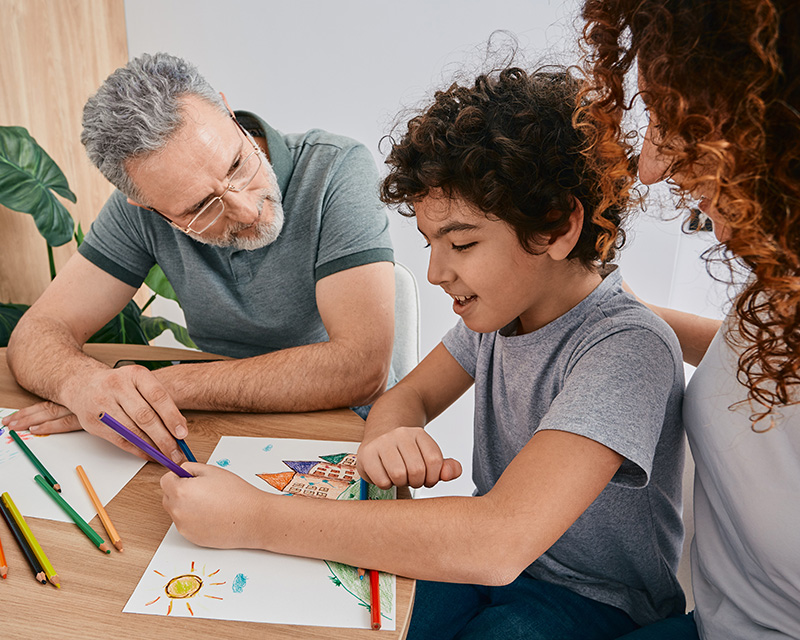 Parents and child during art therapy session