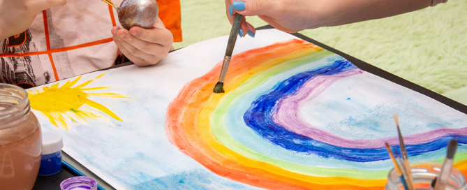 child painting with watercolors