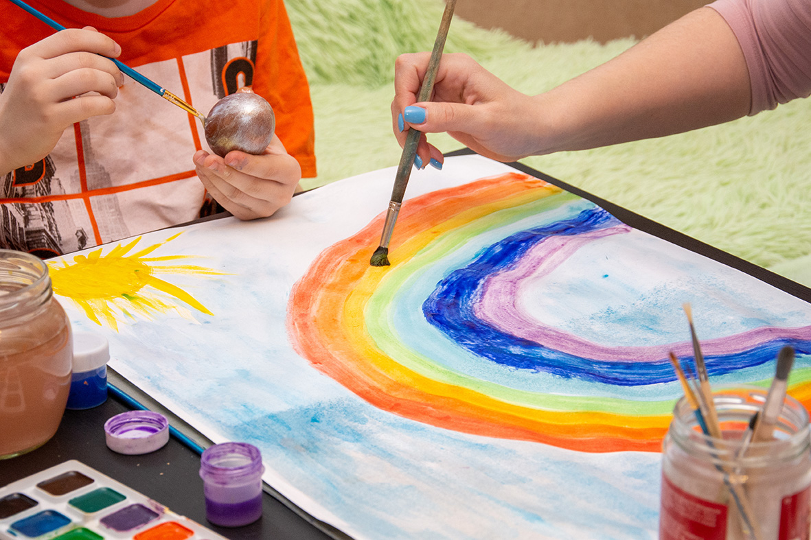 child painting with watercolors