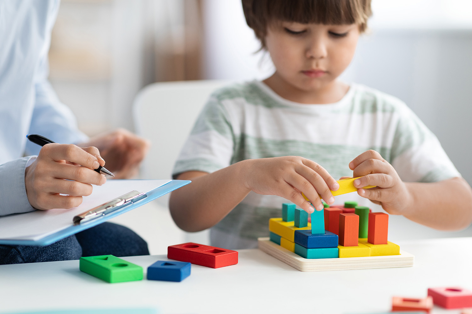 Child during play therapy; Child counseling in Plano