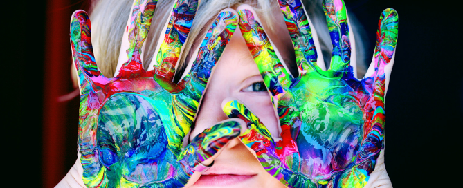 Child with paint on hands; When it's a child phase or when more support is needed
