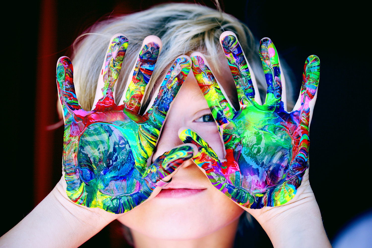 Child with paint on hands; When it's a child phase or when more support is needed
